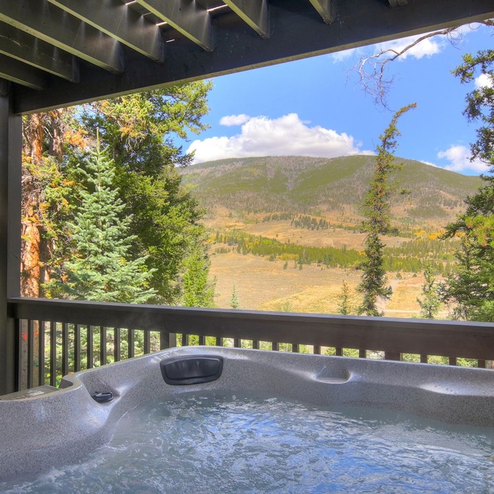 Hot tub with beautiful views of neighboring mountain