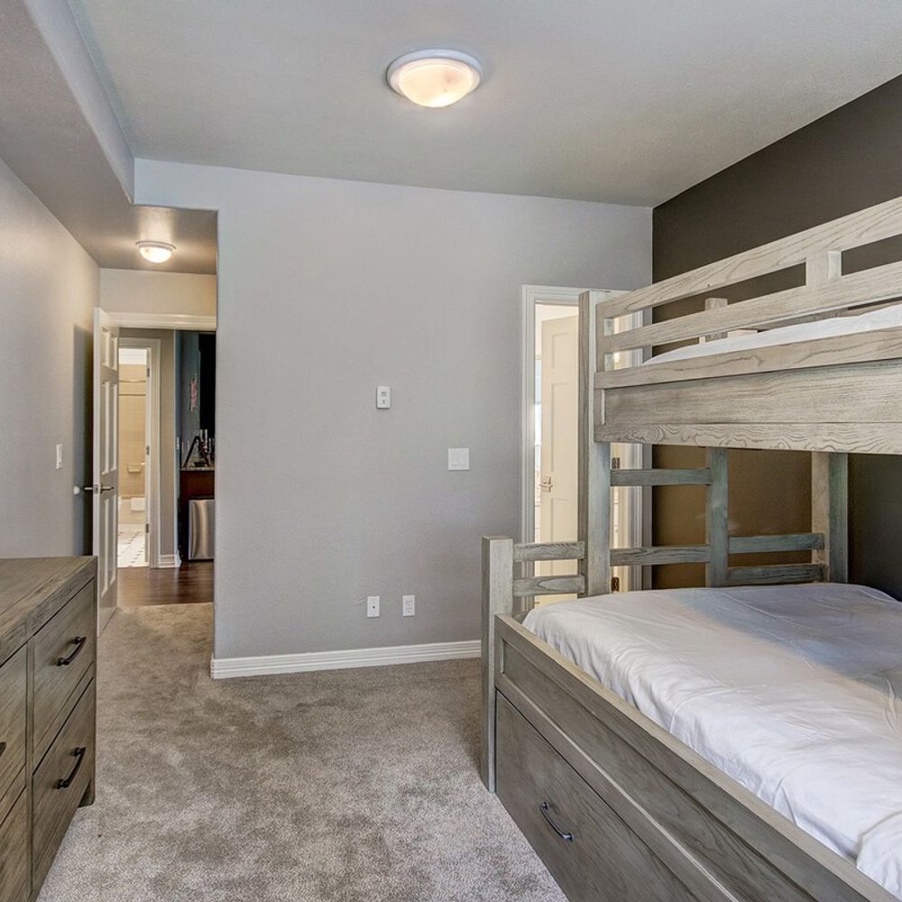 Twin over full bunkbed with twin trundle in bedroom 4