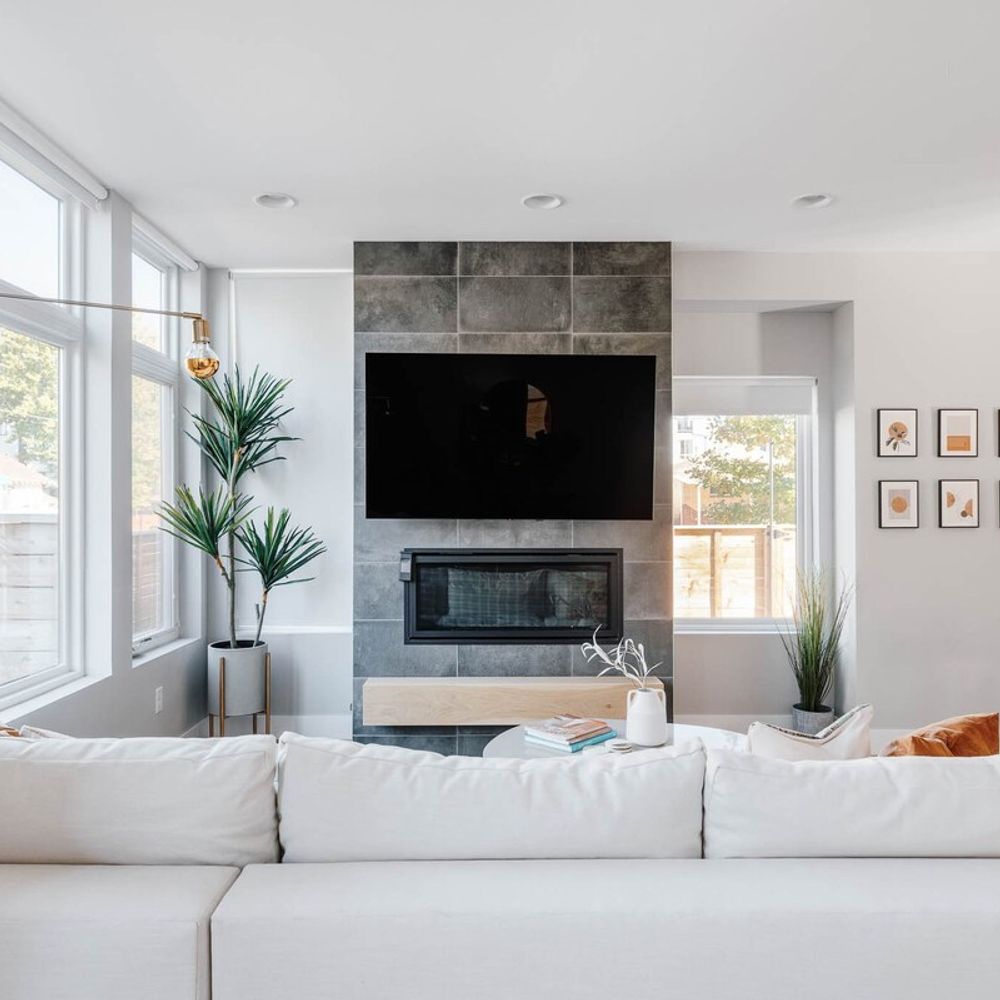 Living area with gas fireplace and TV