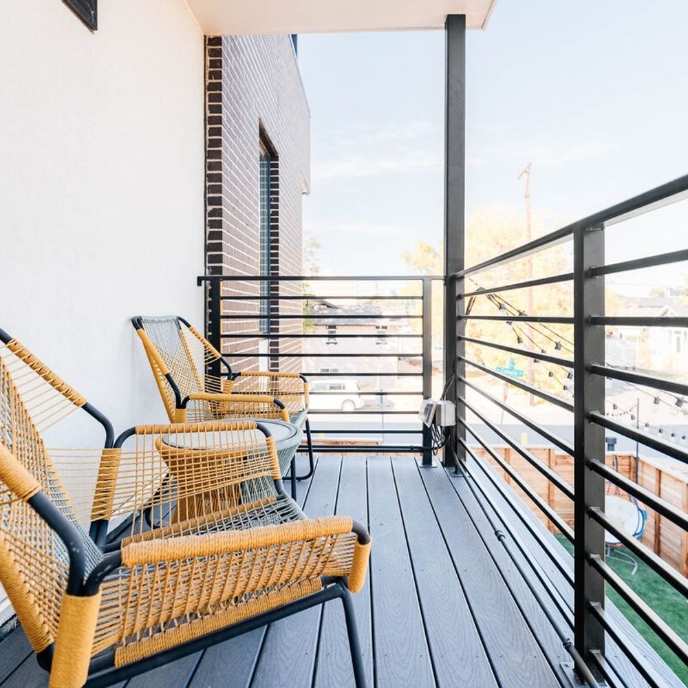 Balcony off of bedroom 3 overlooking the side yard