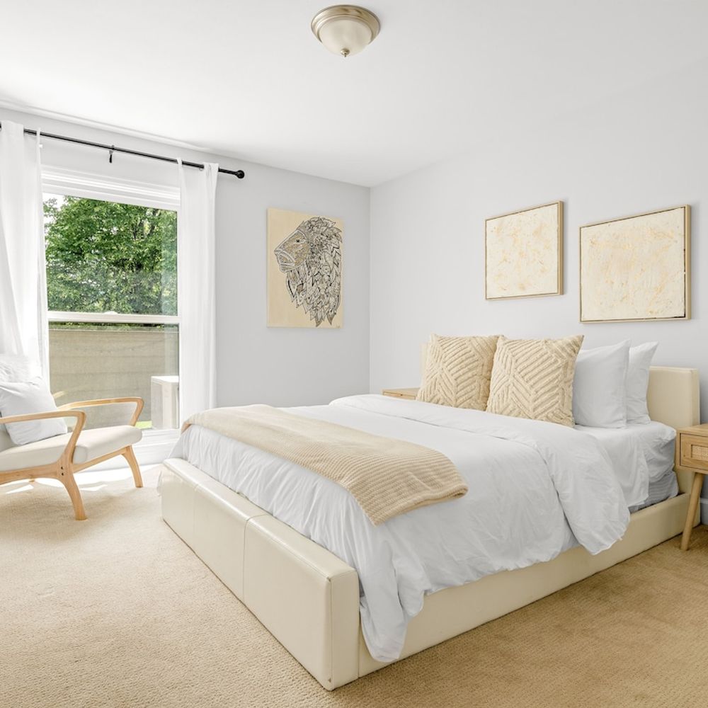 Main floor bedroom with queen bed