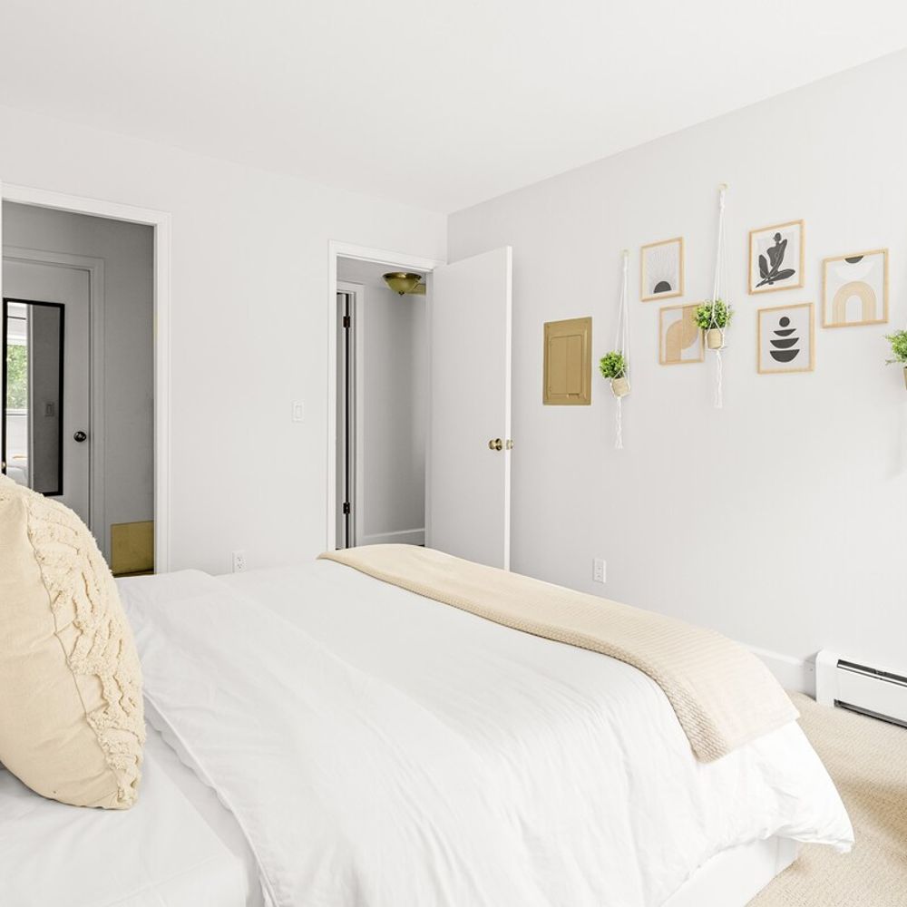 Main floor bedroom has a walk-in closet that connects to a full bathroom