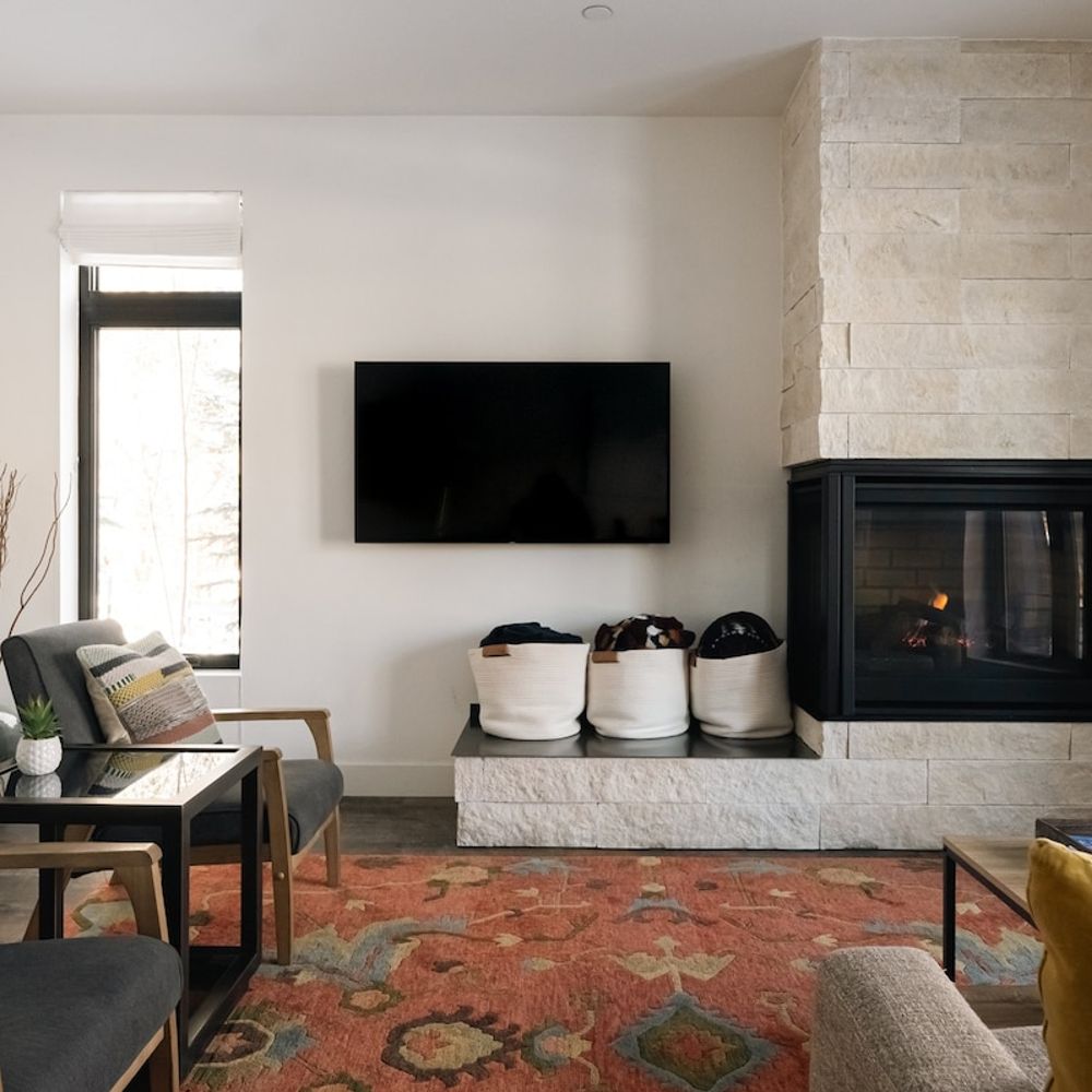 Living area with smart TV and gas fireplace