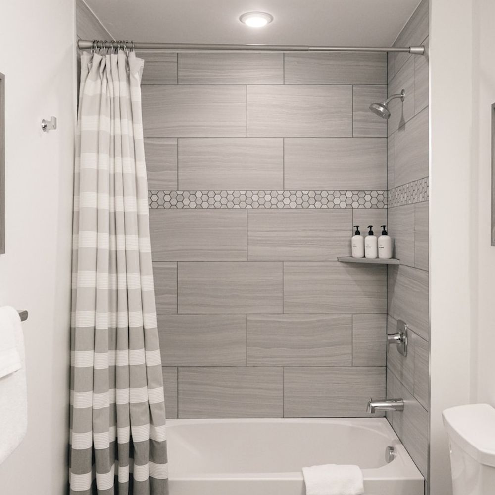 Tub/shower combo in full bathroom 2