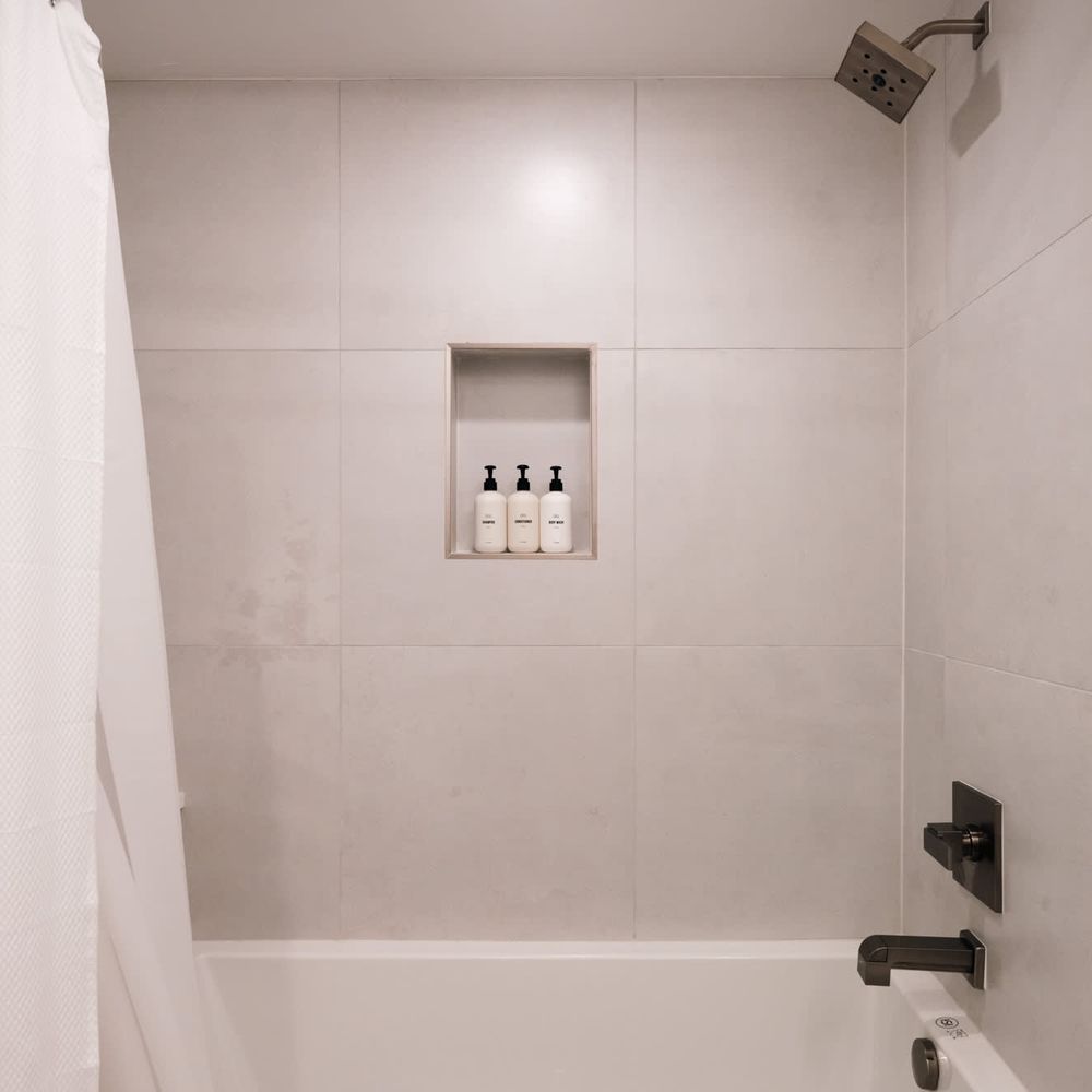 Full bathroom 4 in basement with bathtub