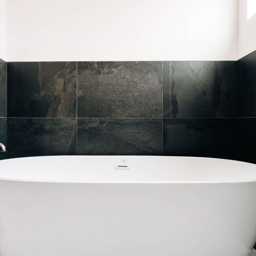 Soaking tub in en suite bathroom