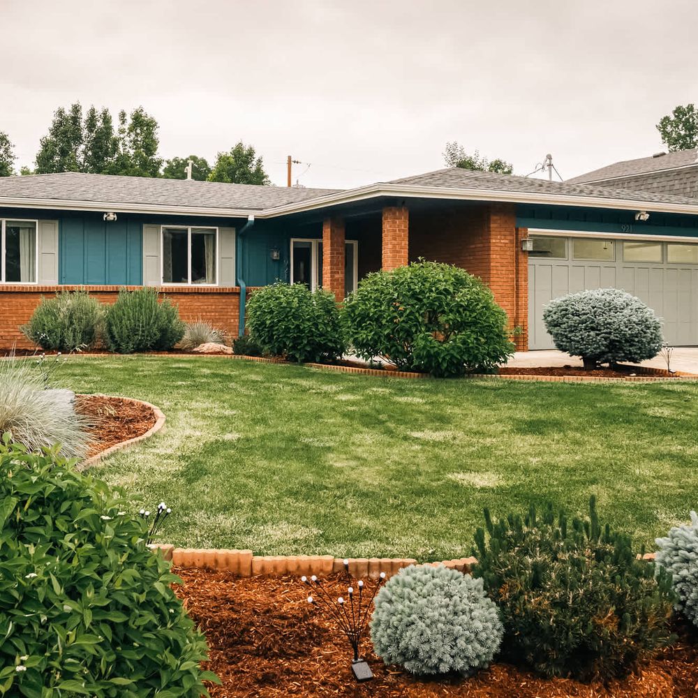 Exterior of home with mature landscaping