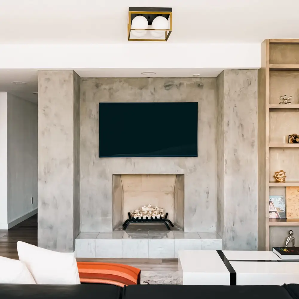 Living area has a 70 inch Smart TV *Fireplace is non-operational and not available for guest use*
