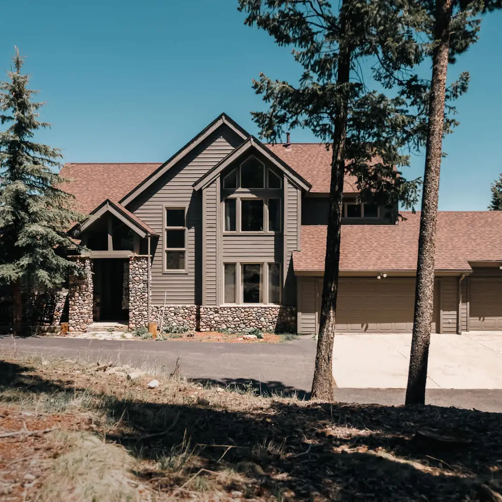 Home exterior showing 3-car garage