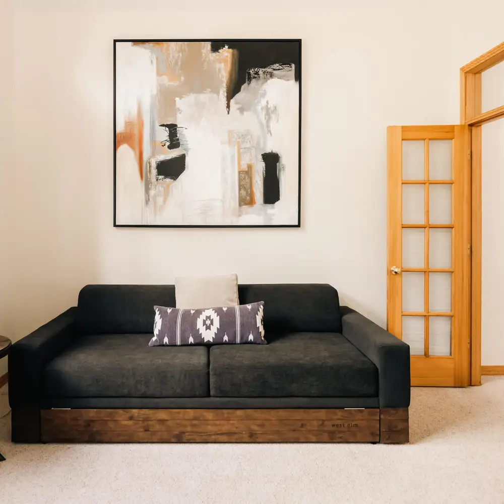 Sofa with a twin-size trundle bed in the office