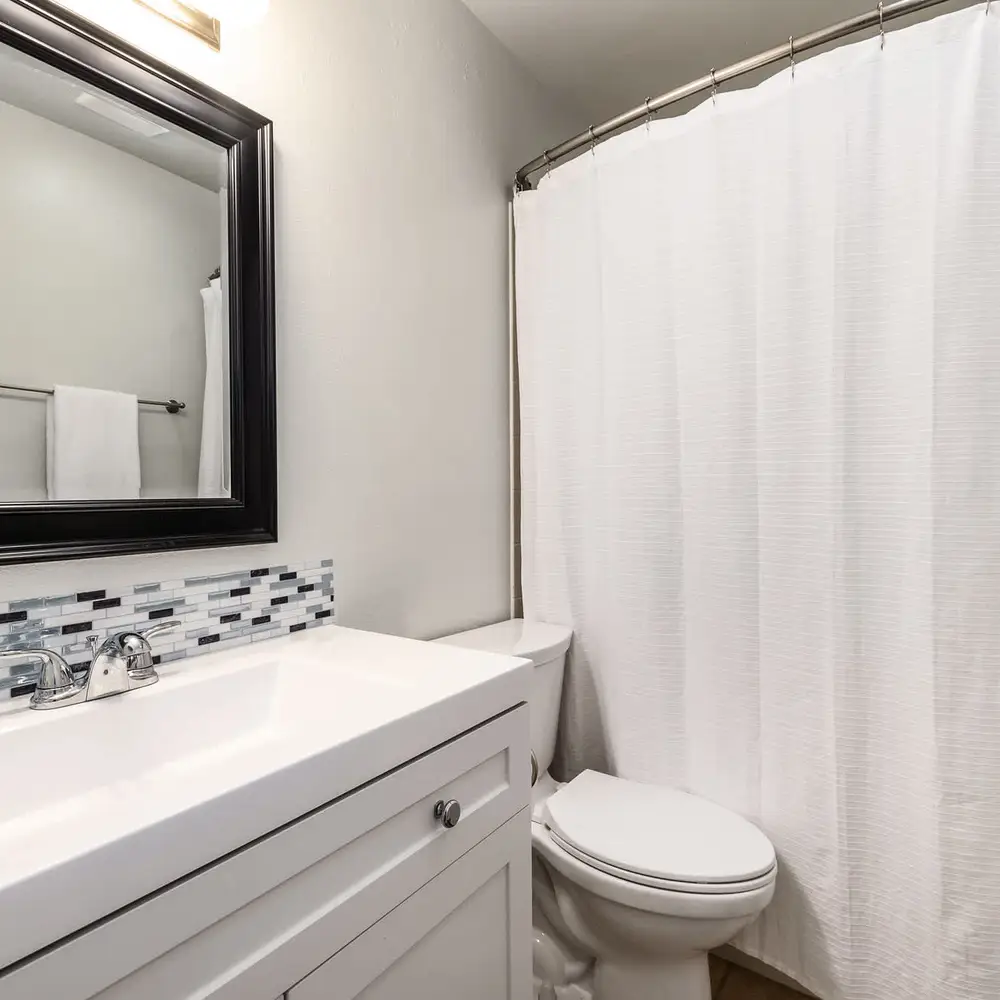 Primary full ensuite private bathroom with tub/shower combo