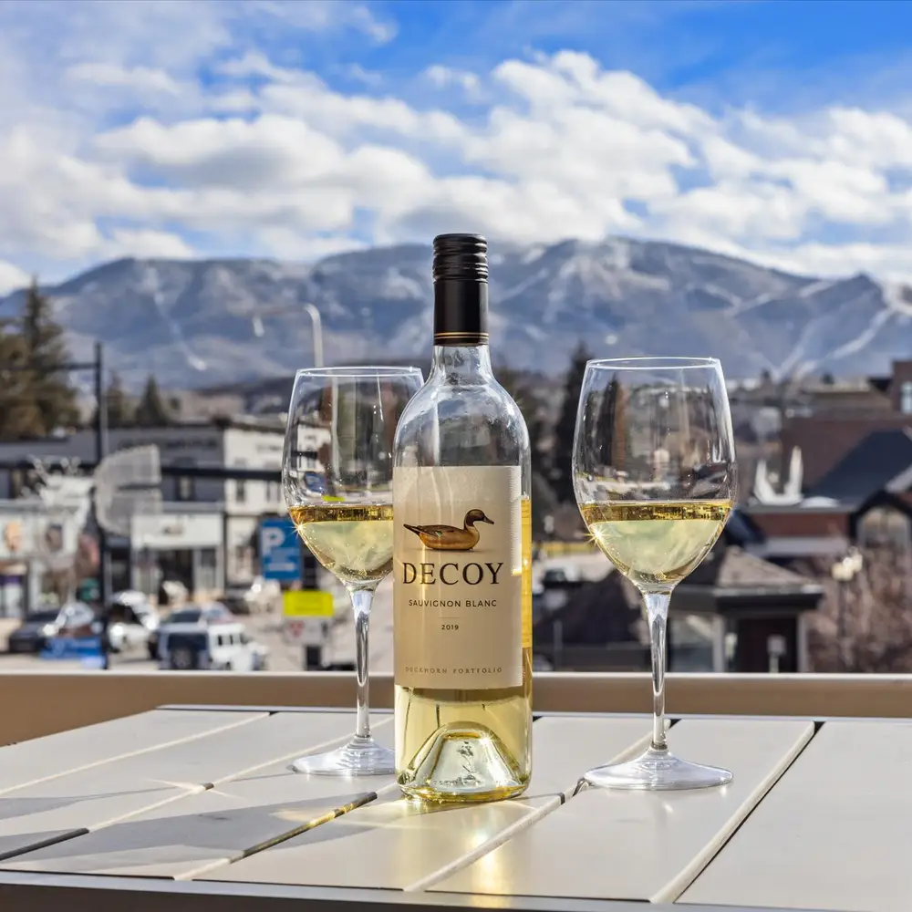 Enjoy a drink on the wraparound deck