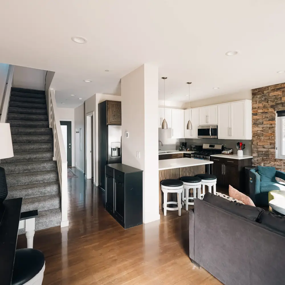 Entry view with living area & kitchen