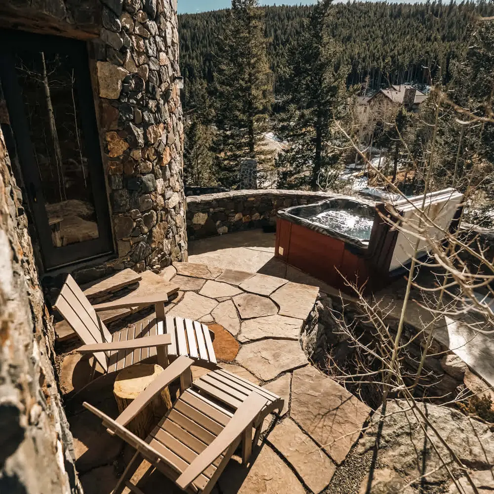 Hot tub with seating outside of the primary bedroom