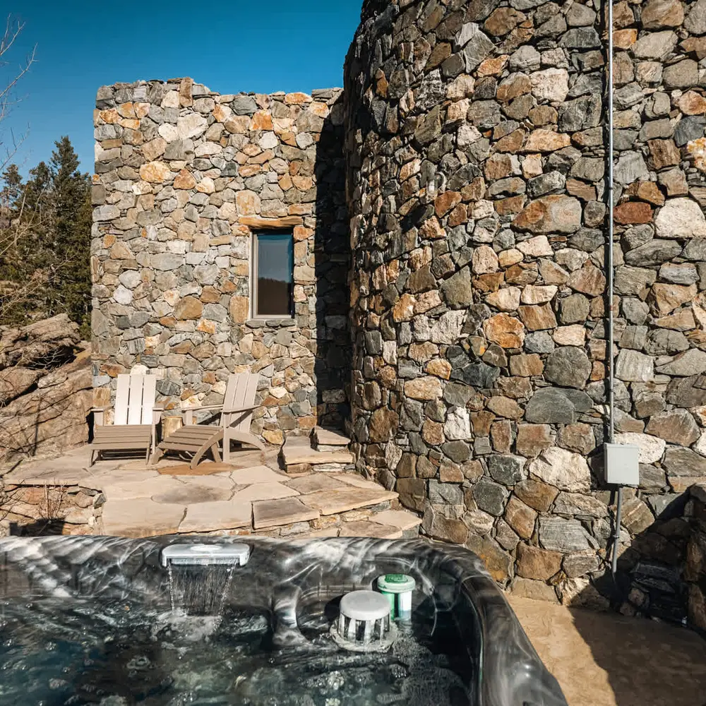 Hot tub with seating outside of the primary bedroom