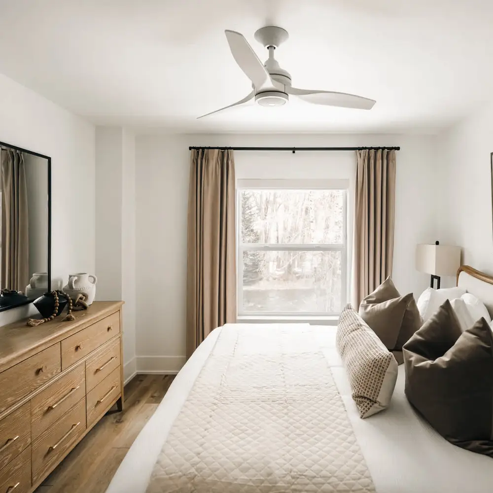 Bedroom 1 has a king bed and ceiling fan
