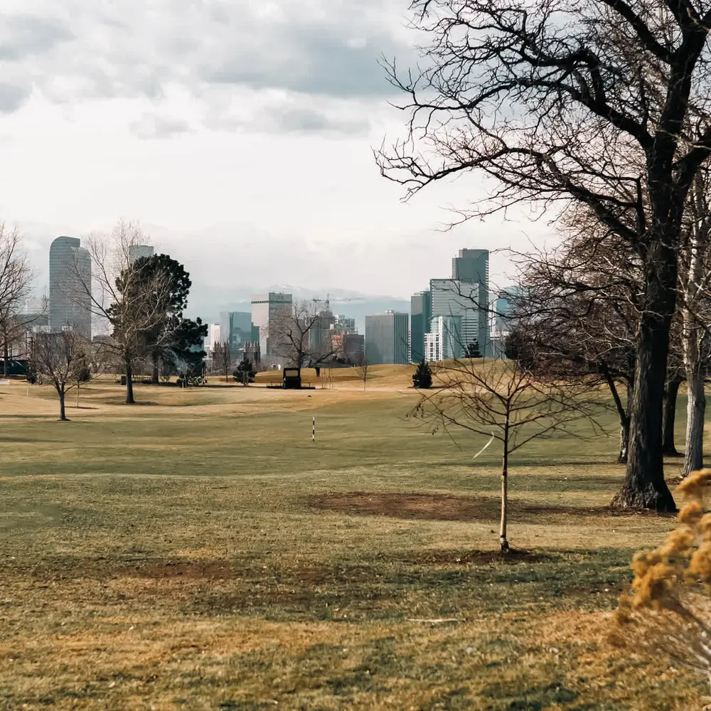 Views of the golf course, City Park, and Downtown Denver