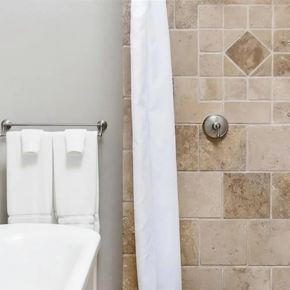 Primary en suite bathroom with soaking tub and separate shower