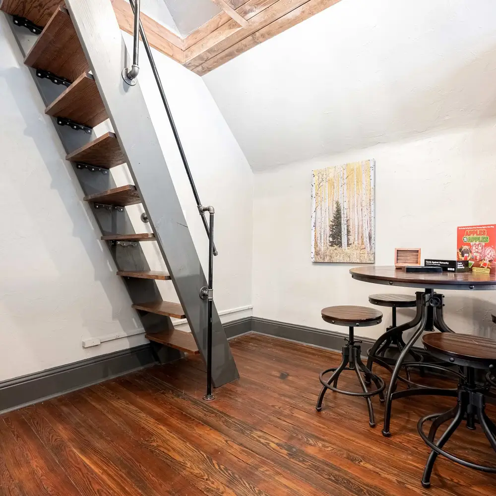 Dining table and ladder to loft