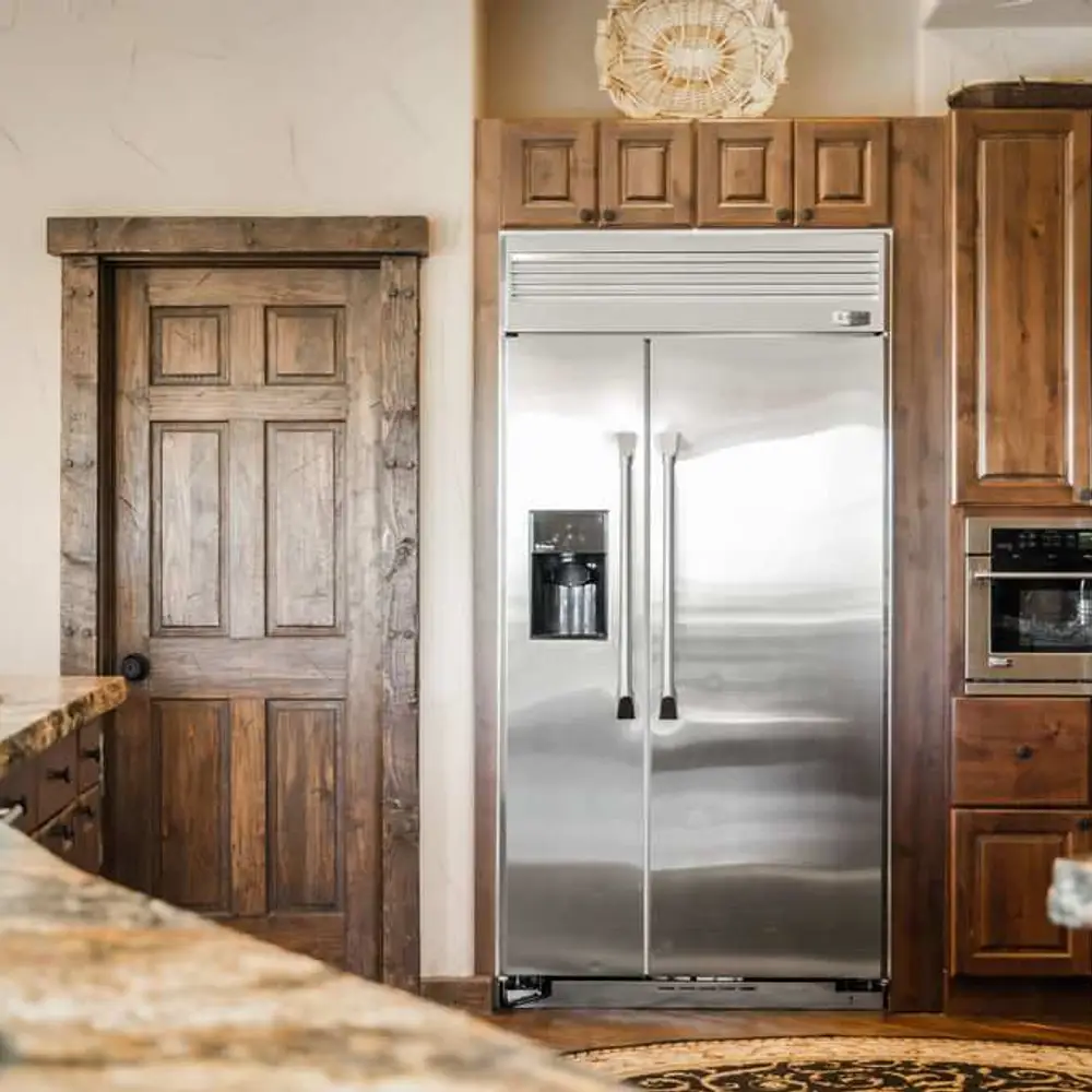 Luxe open kitchen with high-end stainless steel appliances