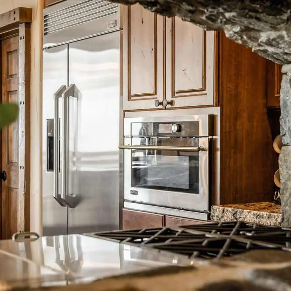 Luxe open kitchen with high-end stainless steel appliances