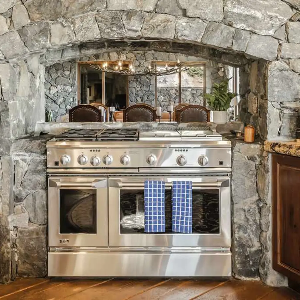 Luxe open kitchen with high-end stainless steel appliances