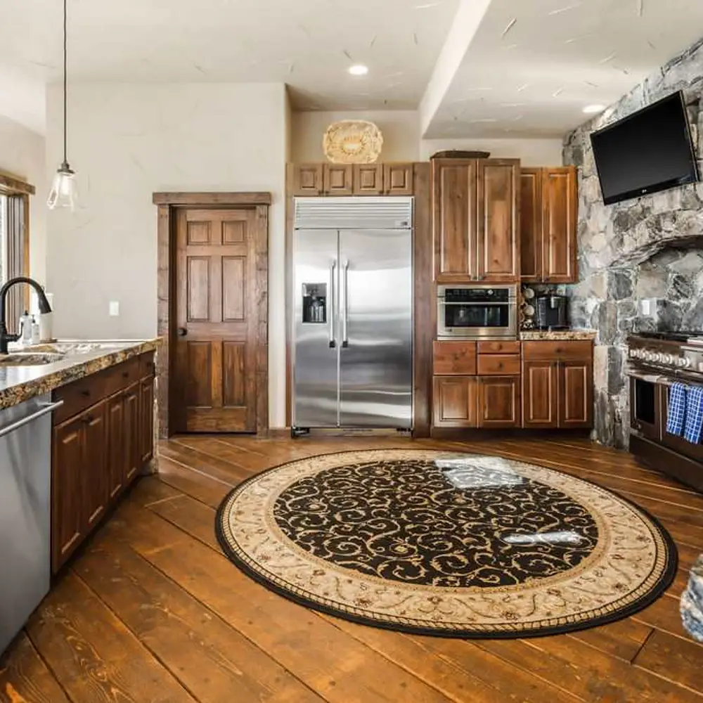 Luxe open kitchen with high-end stainless steel appliances