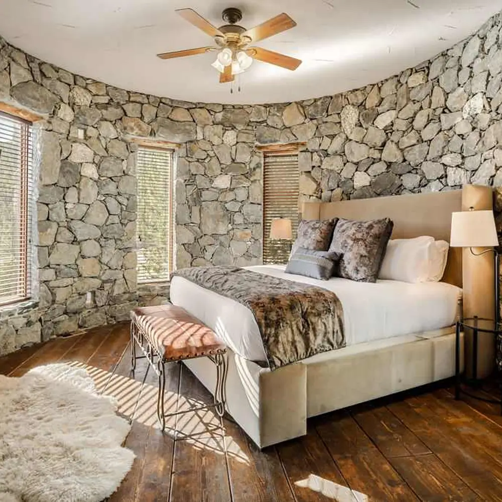 Primary bedroom with a king bed and a flatscreen TV