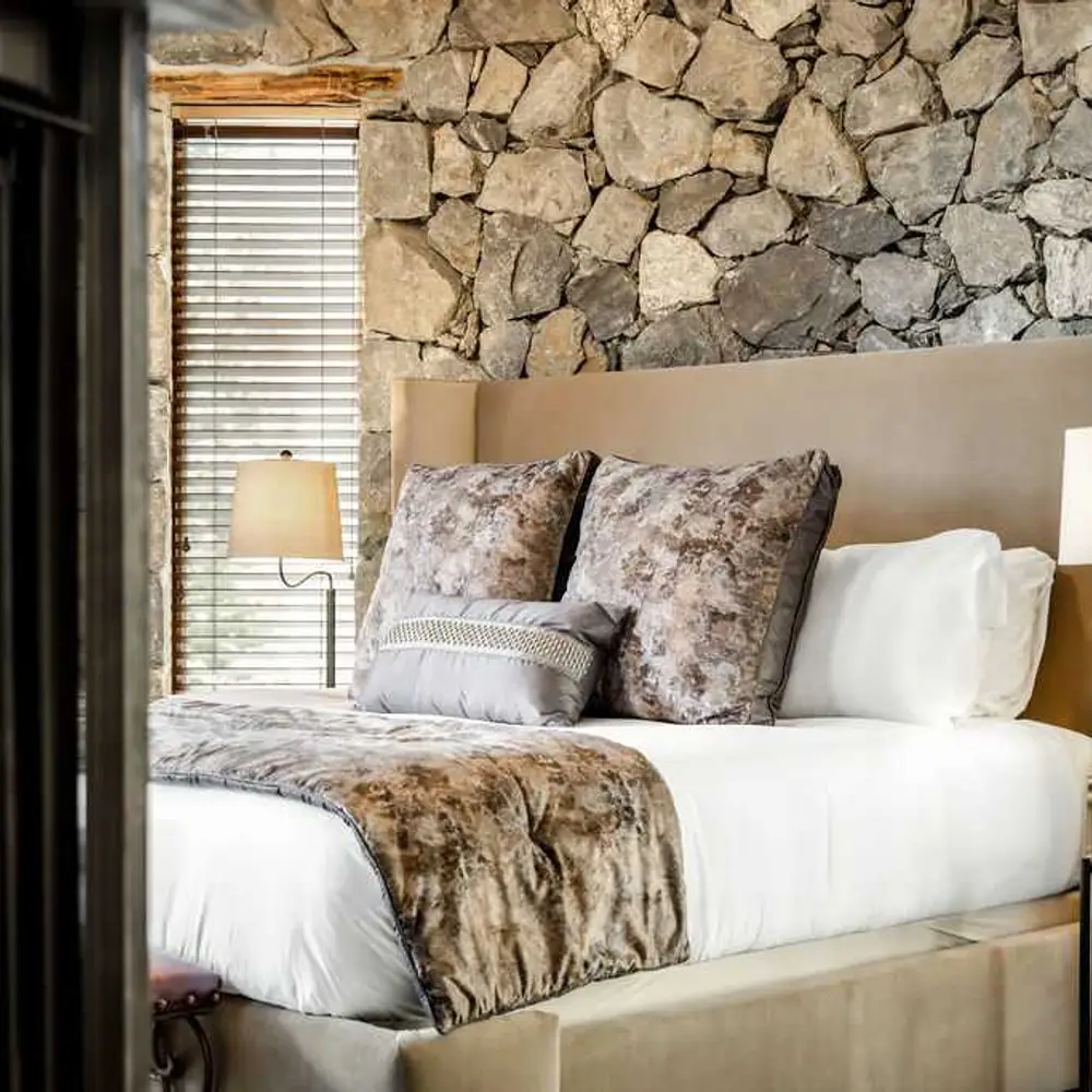 Primary bedroom with a king bed and a gas fireplace