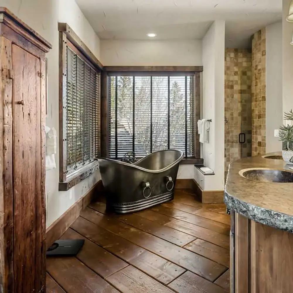 Primary full private ensuite bathroom with dual sinks, soaking tub, walk-in shower, and private patio exit