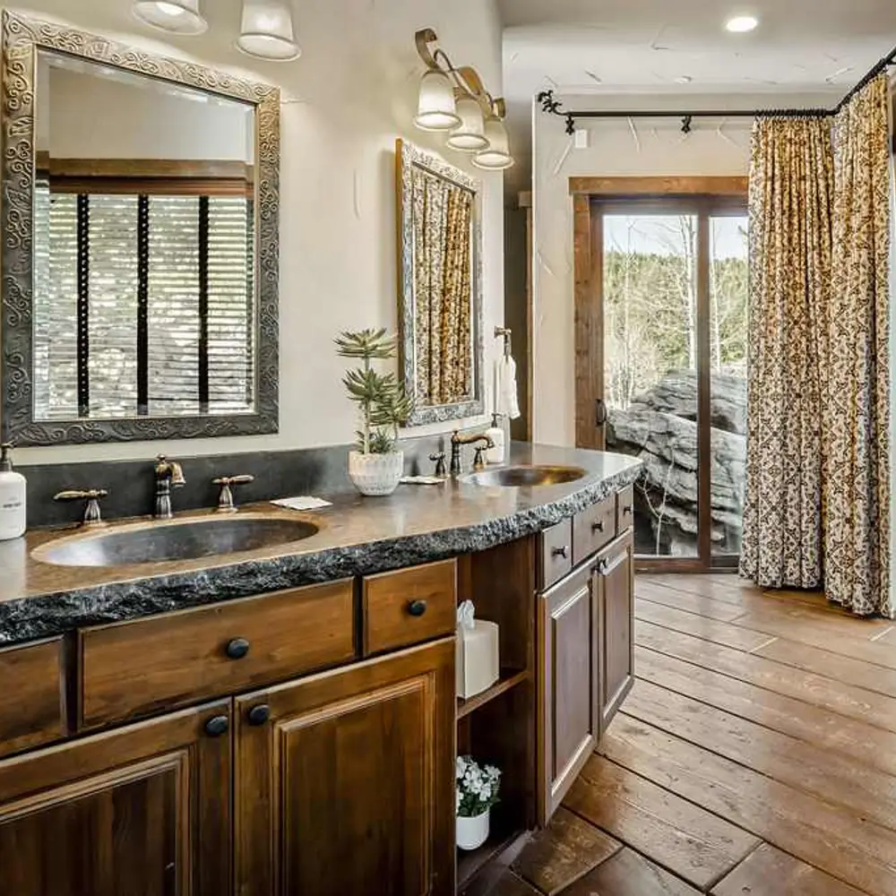 Primary full private ensuite bathroom with dual sinks, soaking tub, walk-in shower, and private patio exit