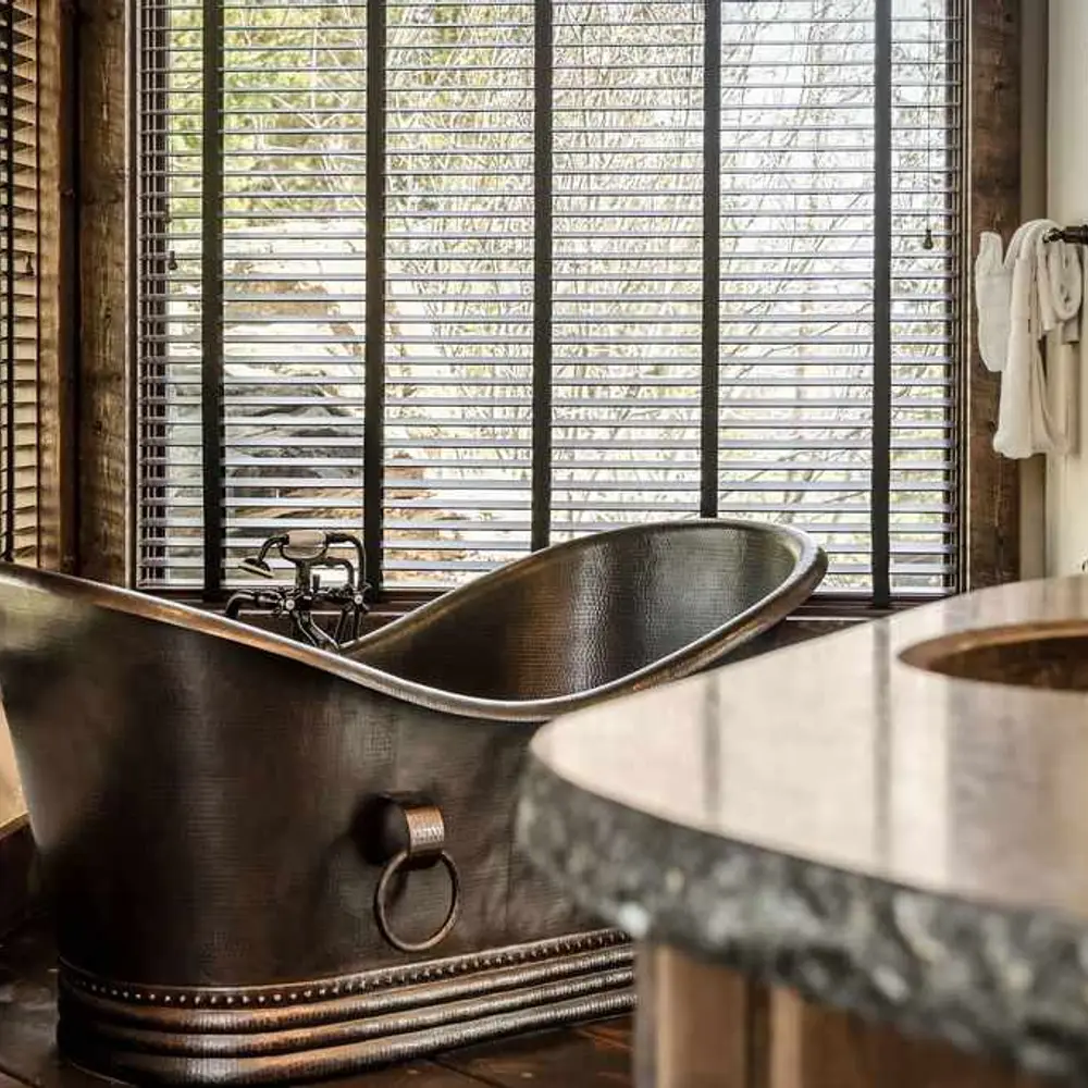 Primary full private ensuite bathroom with dual sinks, soaking tub, walk-in shower, and private patio exit