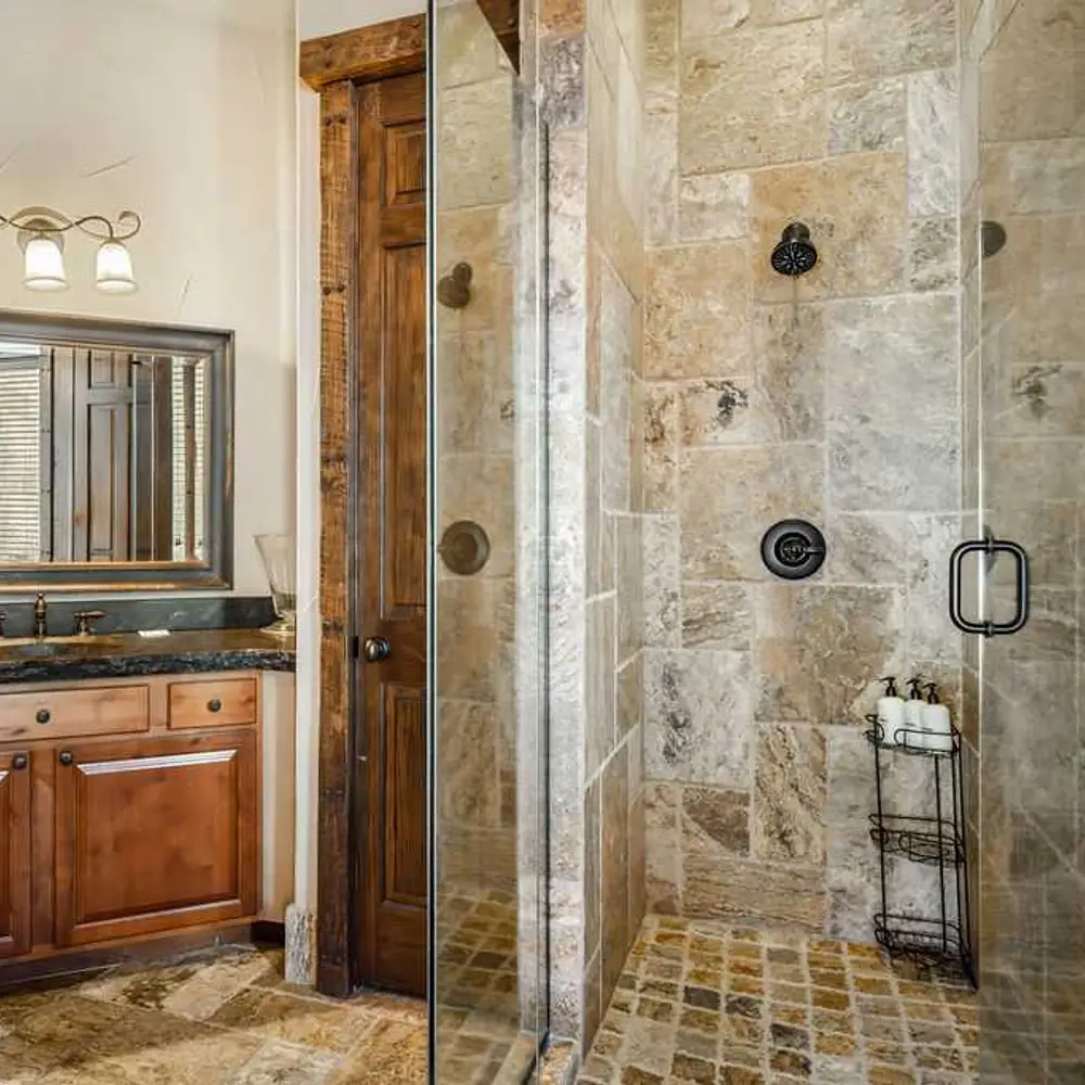 Bedroom 4 private full ensuite bathroom with a walk-in glass shower