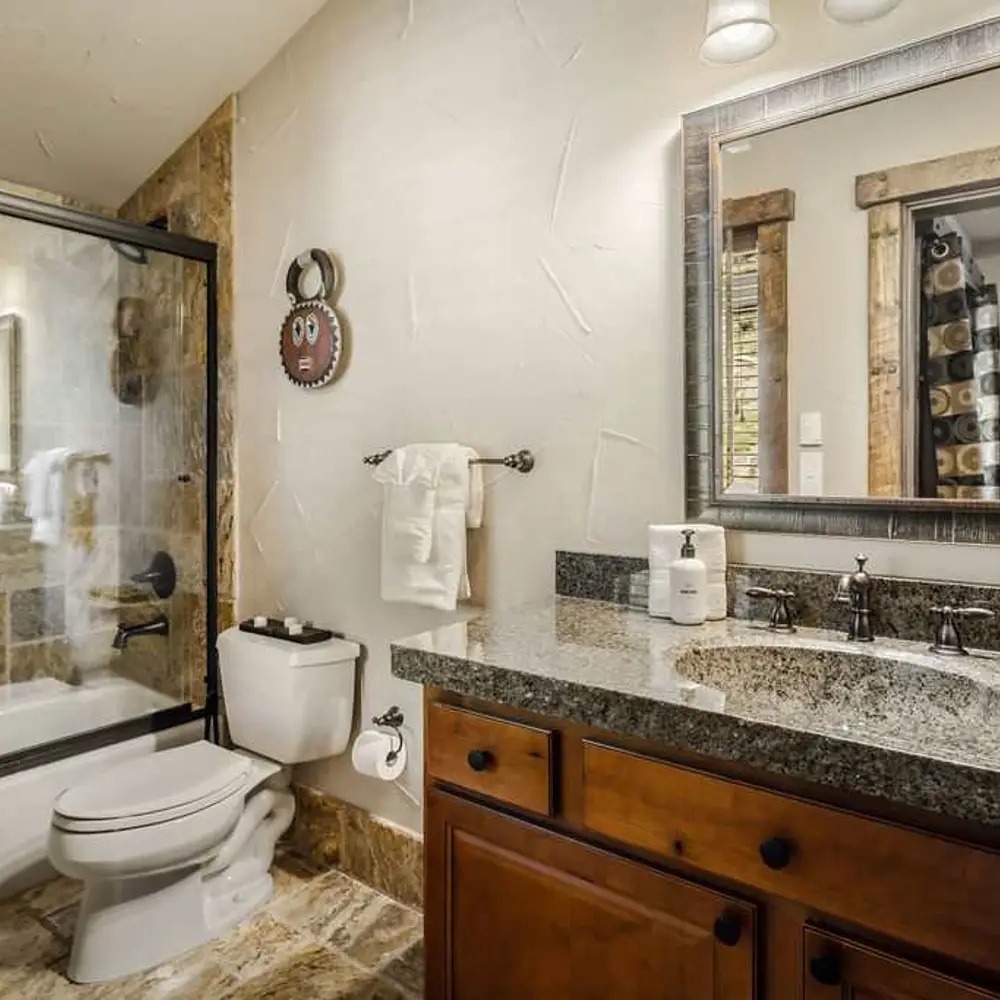 Bedroom 3 private full ensuite bathroom with tub shower combo