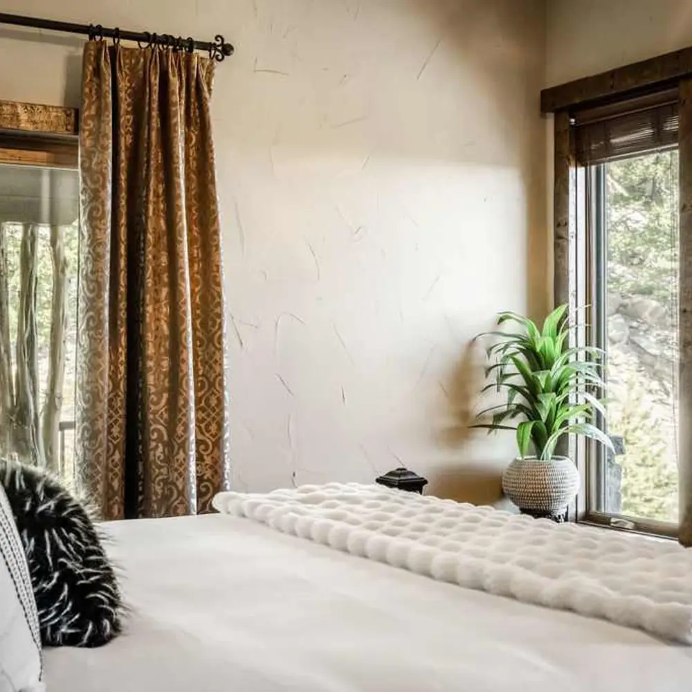 Bedroom 2 with a king bed, a flatscreen TV, balcony exit, and a private full ensuite bathroom