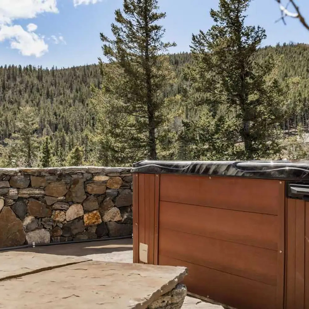 Hot tub with seating outside of the primary bedroom