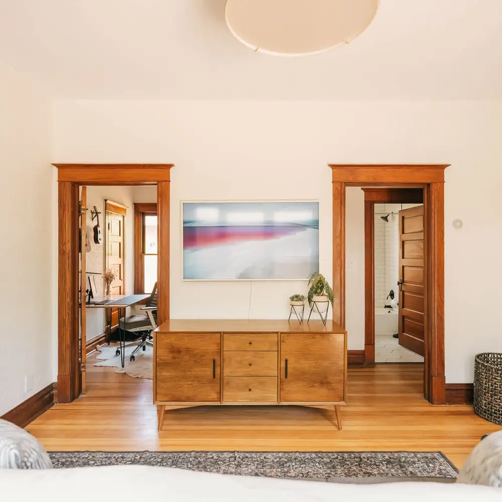 Living area connects to office, bathroom, and back bedroom