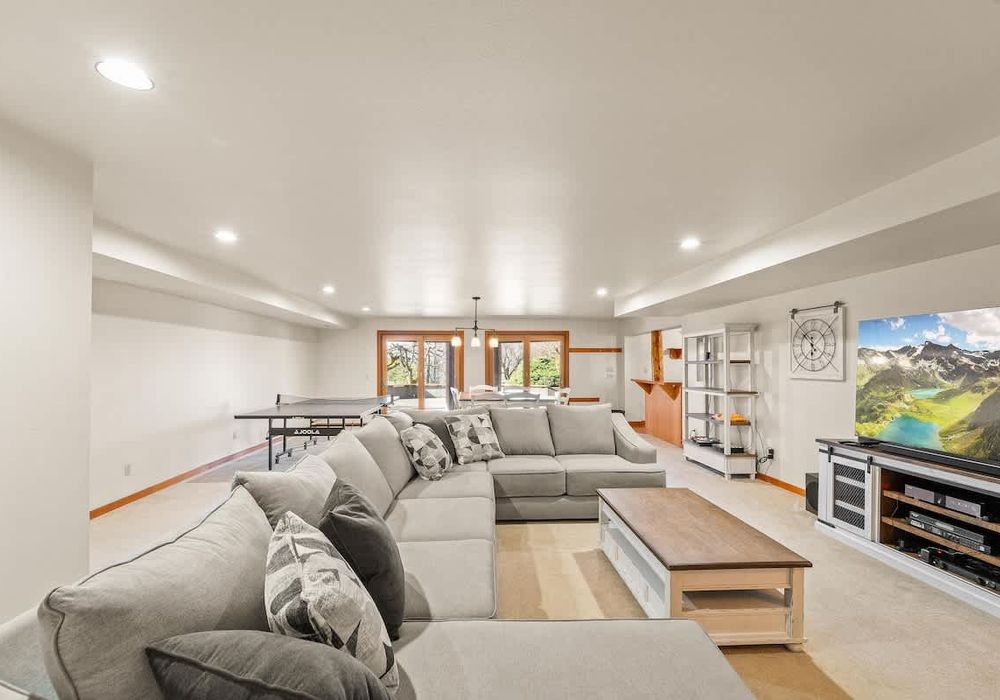 The downstairs living room with the huge comfy couch!