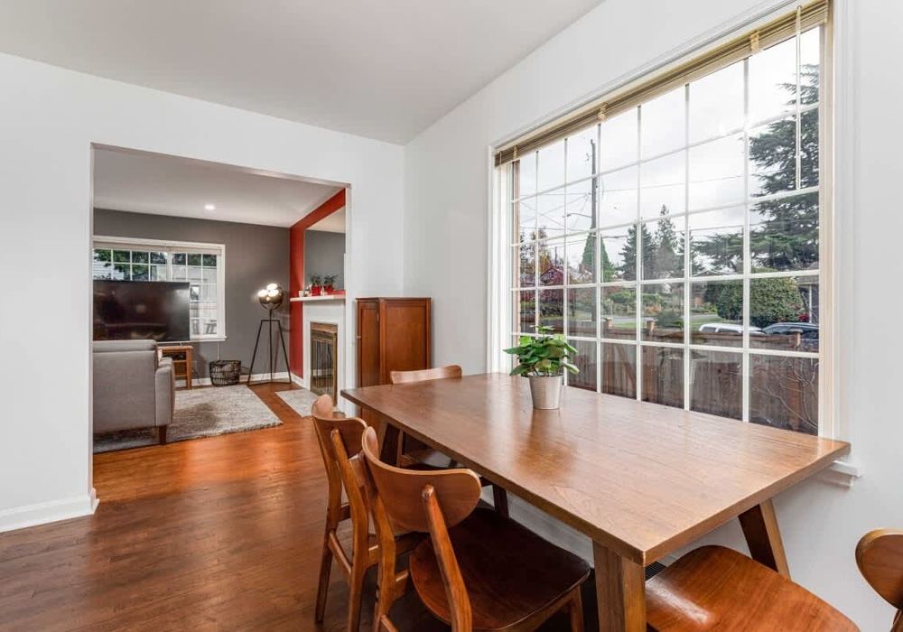 Dining table off the living room and kitchen