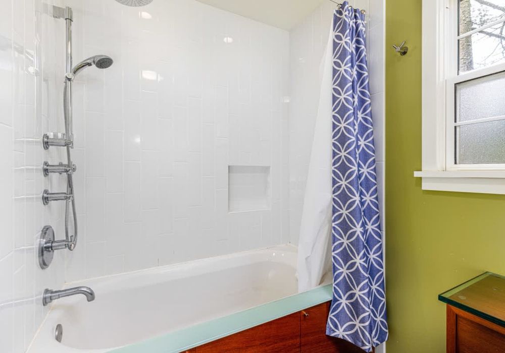 Main floor bathroom tub and shower