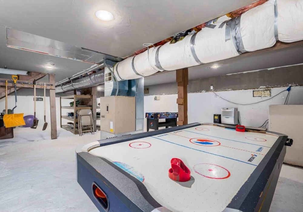 The game room downstairs with foosball, table tennis and air hockey!