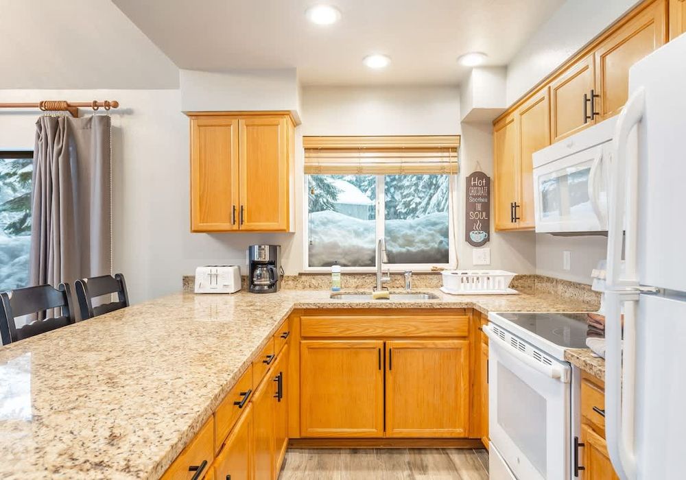The cabin is equipped with a full kitchen.