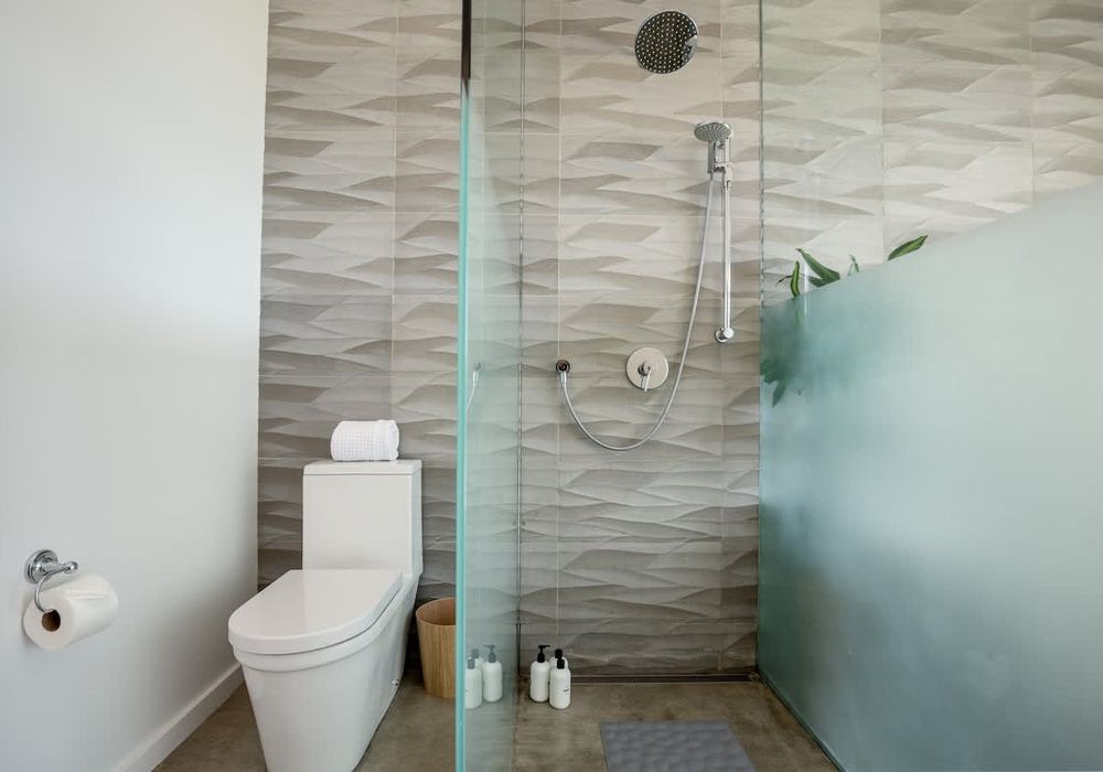 The primary bathroom, with separate shower and tub.