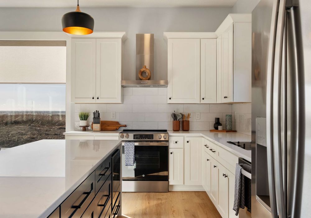 Full size stove, open shelves, and full cookware - set up for real cooking and casual meals.