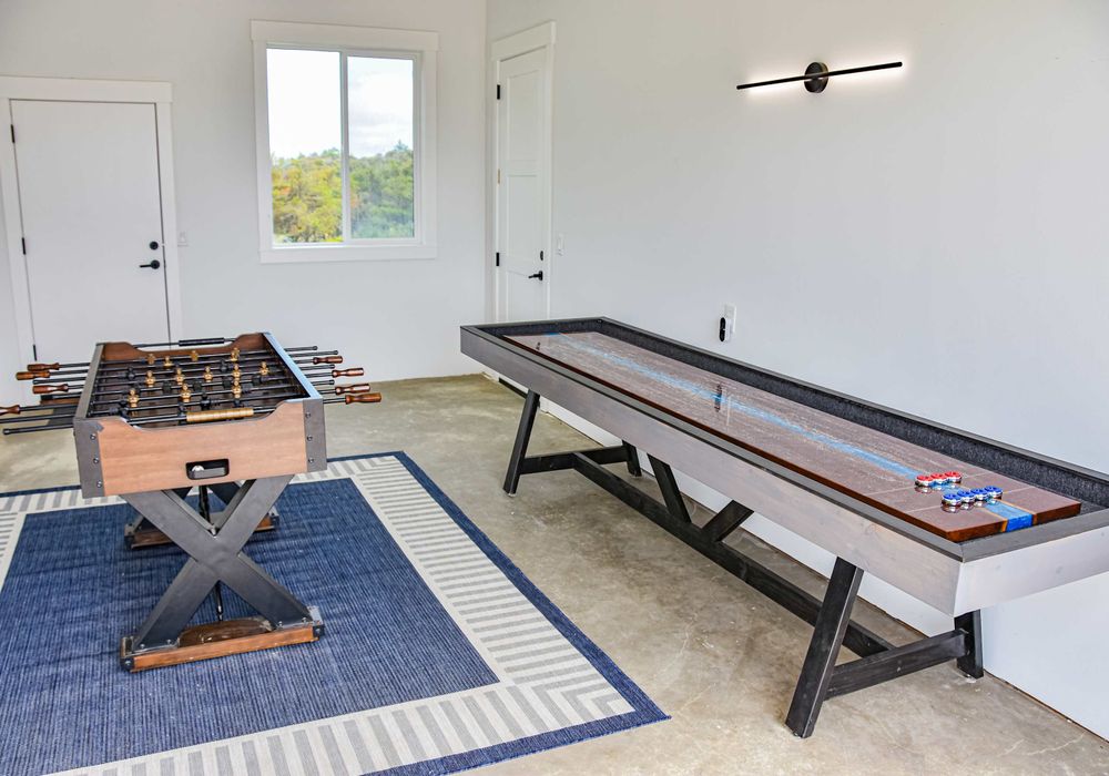 Large game room with space to play and hang out—ideal for groups or rainy days.