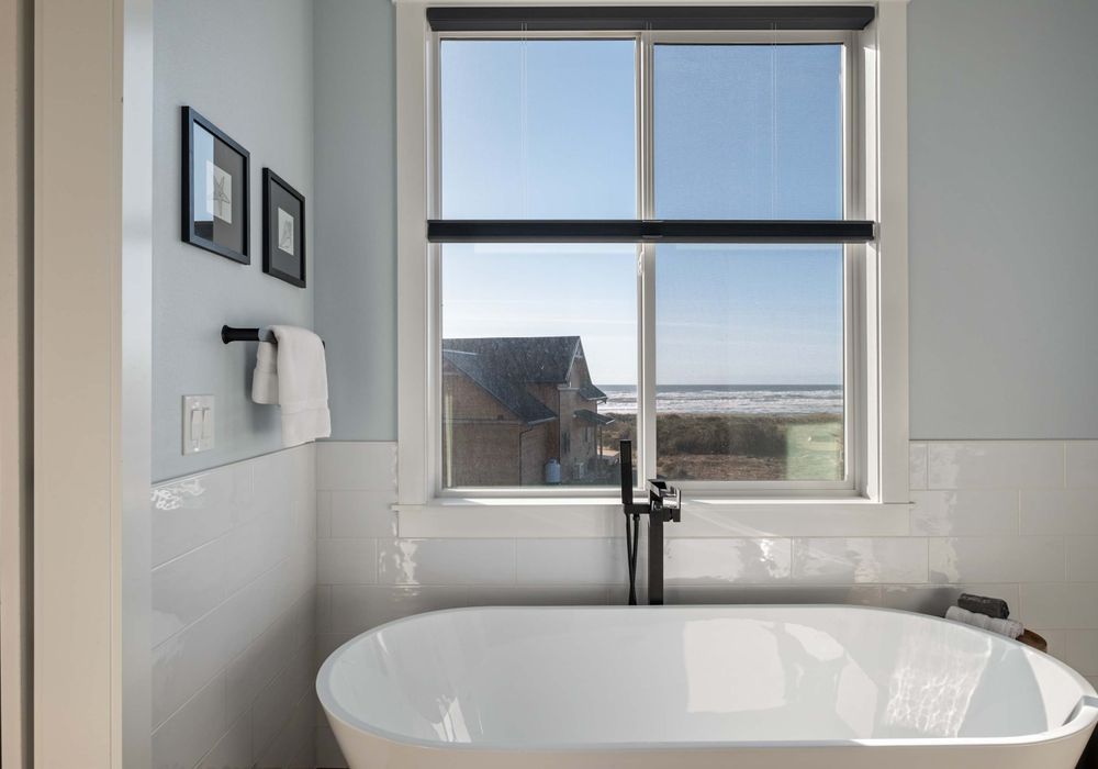 Unwind in the deep tub while taking in peaceful natural light and sky views