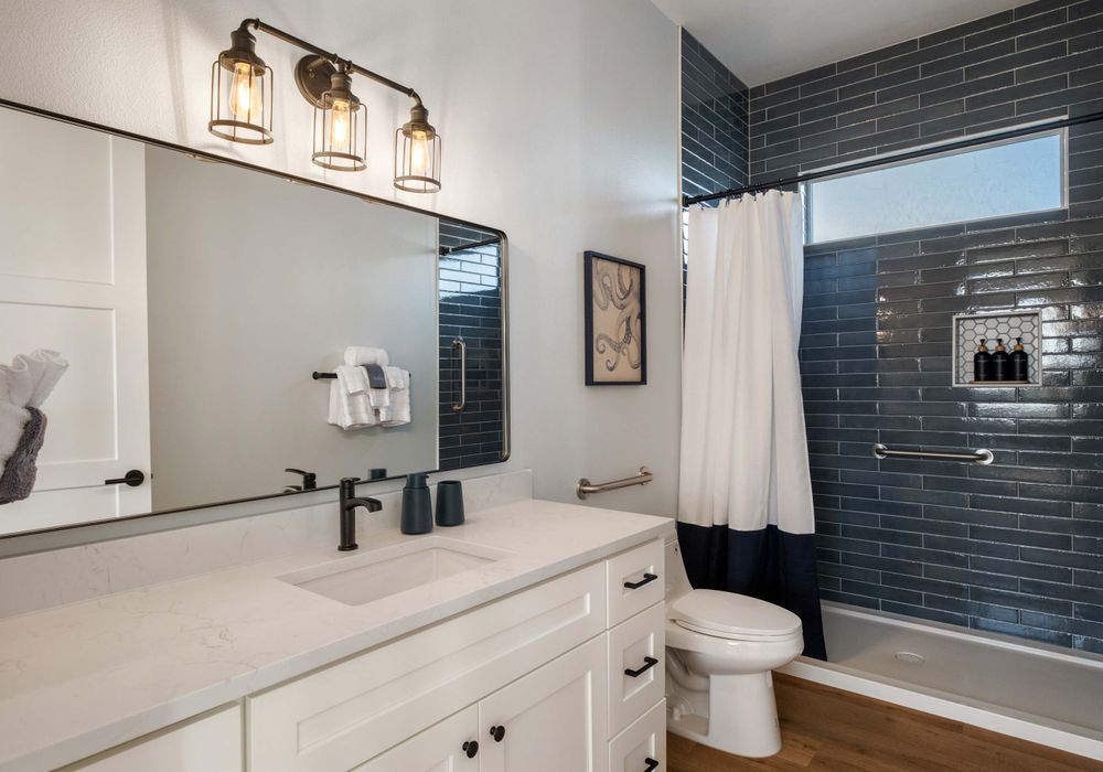 Bathroom 2 of 3 - bright, clean, and ready with essentials.