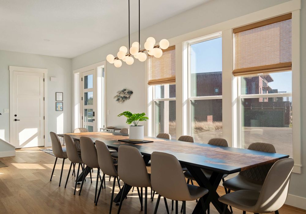 Large dining area with ocean light and space for the whole group.