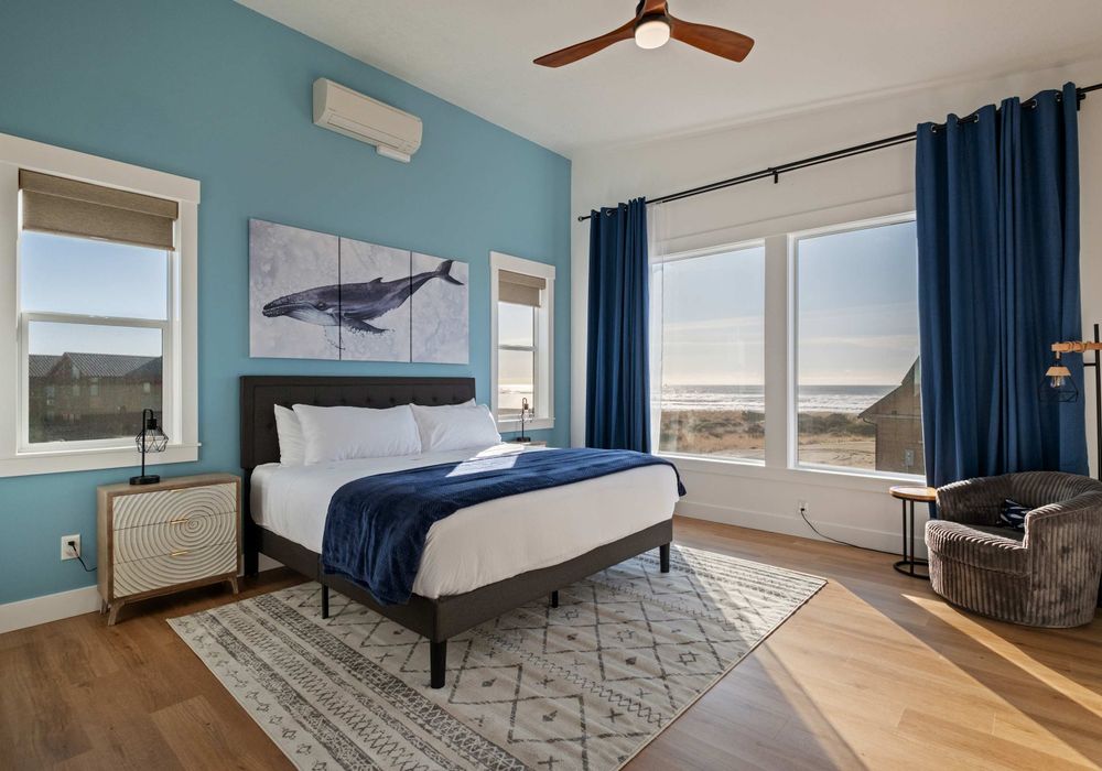 Upstairs king suite with expansive views—private and bright.