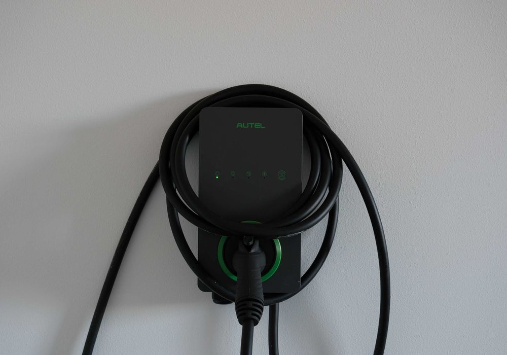 Charge up on-site—home includes electric vehicle charging access.